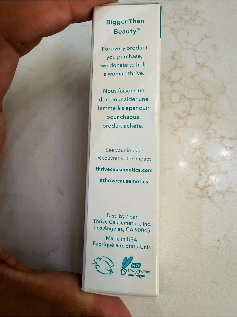 Thrive Causemetics White Box with Teal Branding